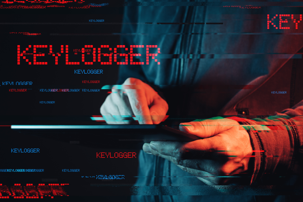 A man installs a keylogger on an Ipad.